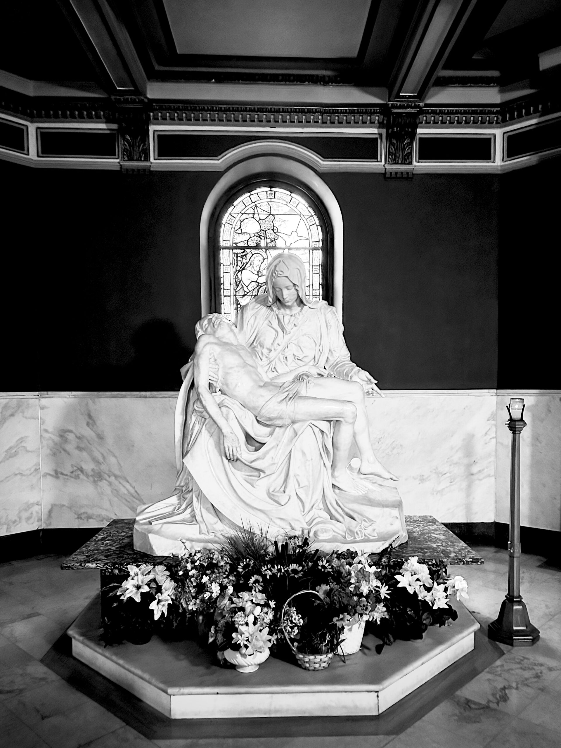 A black and white image of the sculpture named The Pieta